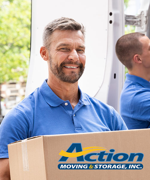 Man carrying moving box outside